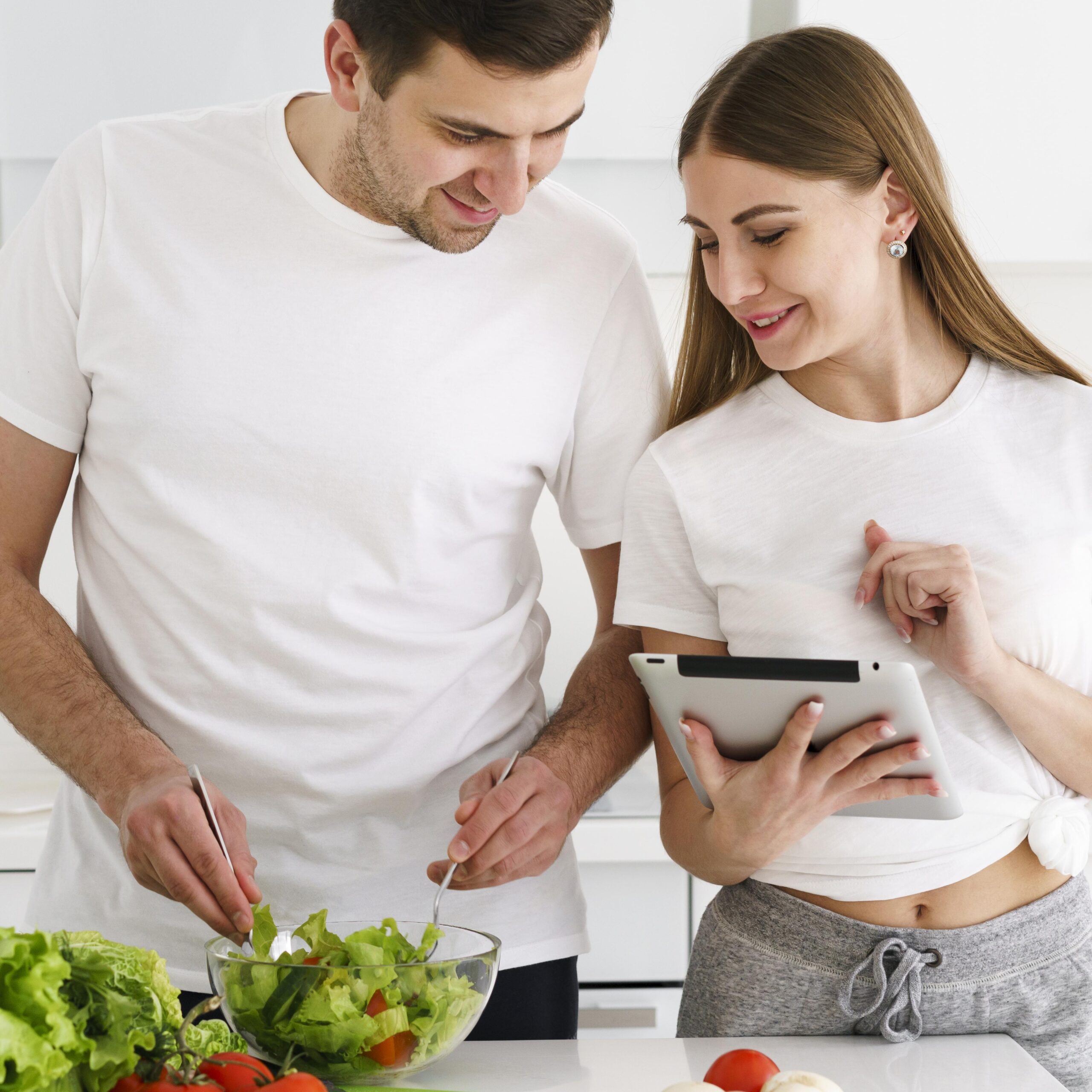 couple making salad